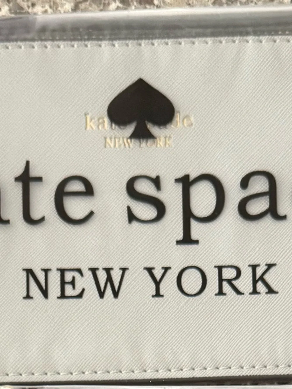 kate spade White Wallet with Black Logo and Spade Accent